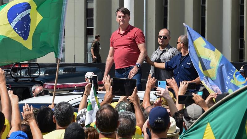 Presiden Brasil Jair Bolsonaro Ikut Demo Tolak Kebijakan "Di Rumah Saja"