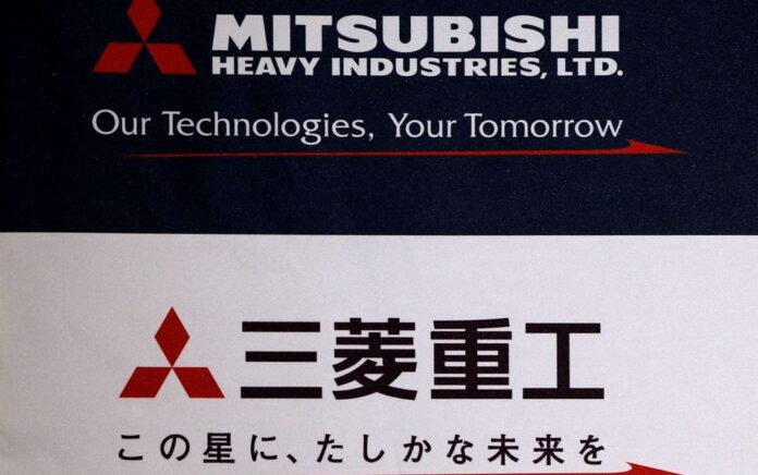 Logo Mitsubishi Heavy Industries terlihat pada konferensi pers perusahaan di Tokyo, Jepang 9 Mei 2016. Foto: Reuters.