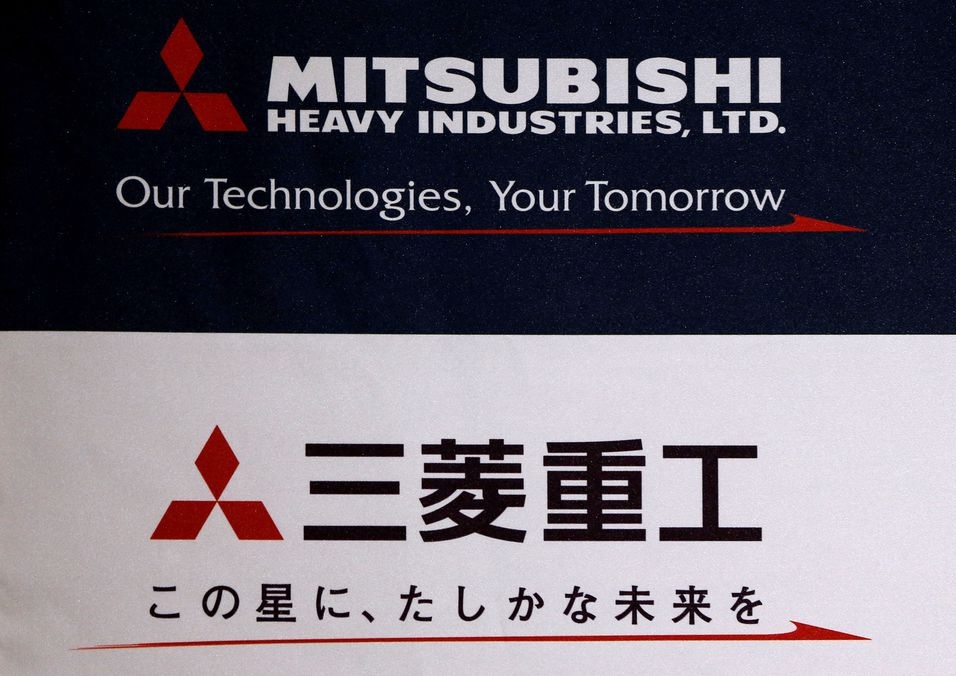 Logo Mitsubishi Heavy Industries terlihat pada konferensi pers perusahaan di Tokyo, Jepang 9 Mei 2016. Foto: Reuters.