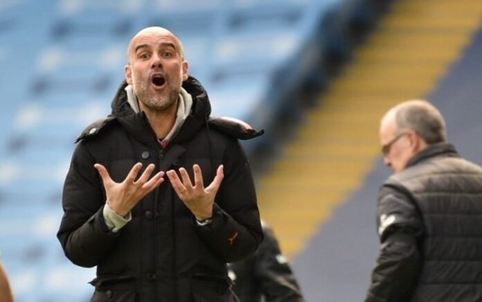 Pelatih Man City, Pep Guardiola (foto: AFP/Pool)