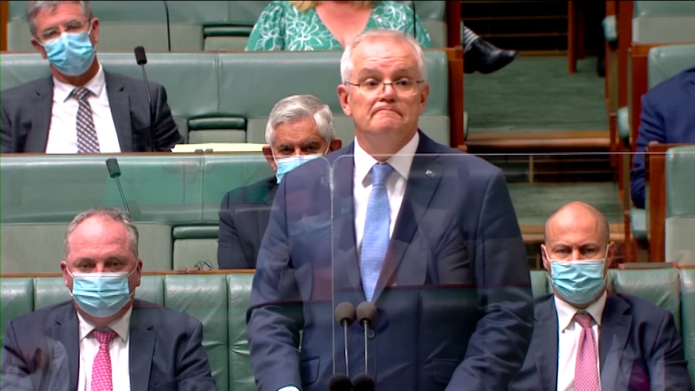 PM Australia Scott Morrison saat meminta maaf di hadapan Parlemen Australia, Selasa, 8 Februari 2022. Foto: Reuters.