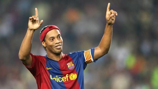 Rans Cilegon Resmi Pinang Ronaldinho (foto: AFP/lluis Gene)