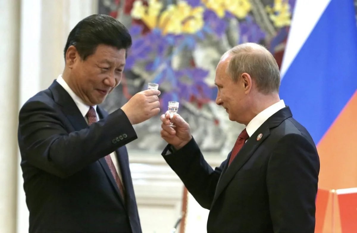 Pemimpin China Xi Jinping dan Pemimpin Rusia Vladimir Putin.
