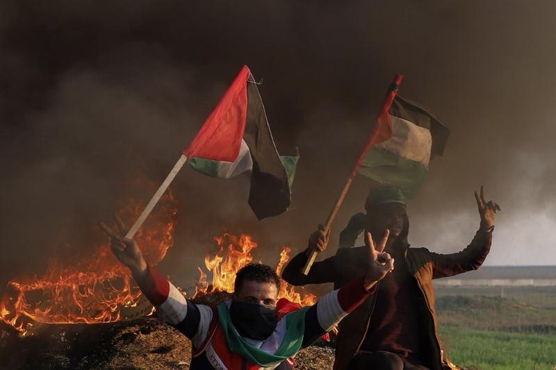 Warga Palestina ambil bagian dalam sebuah aksi unjuk rasa menyusul pembunuhan sembilan warga Palestina oleh pasukan Israel di dekat perbatasan Gaza-Israel, sebelah timur Gaza City, pada 26 Januari 2023. Foto: Xinhua/Rizek Abdeljawad.