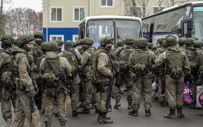 Mobilized Russian reservists at an assembly station.Russian Defence Ministry / TASS