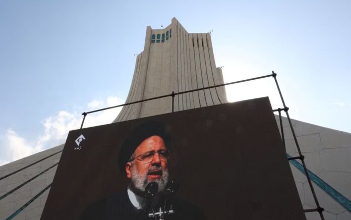 Presiden Iran Ebrahim Raisi terlihat pada pameran peringatan 44 tahun Revolusi Islam di Teheran, Iran, 11 Februari 2023. Majid Asgaripour/WANA/Reuters.