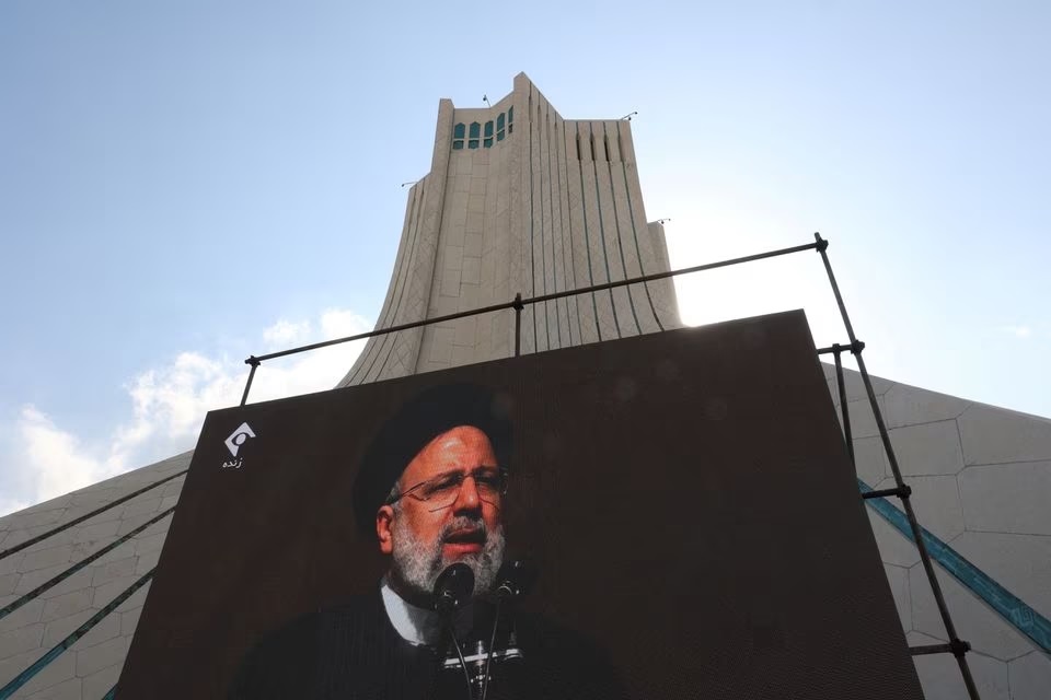 Presiden Iran Ebrahim Raisi terlihat pada pameran peringatan 44 tahun Revolusi Islam di Teheran, Iran, 11 Februari 2023. Majid Asgaripour/WANA/Reuters.