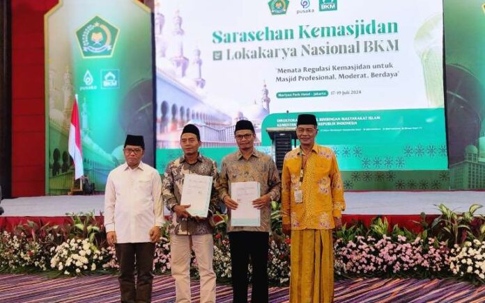 MoU dibidang Gerakan Wakaf Uang berbasis Masjid pada acara sarasehan dan Lokakarya Nasional BKM di Merlynn Park Hotel, Jakarta, Kamis malam (17/07/2024).